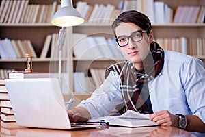 The young writer working in the library