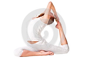 Young yoga female doing yogatic exericis photo