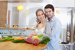 Young Ð¡ouple Ð¡ooking in The Kitchen. Healthy food