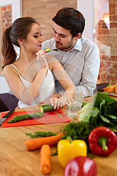 Young Ð¡ouple Ð¡ooking in Ð•he Kitchen. Healthy food