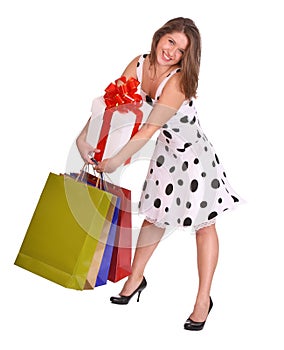 Young girl with gift bag and gift box.