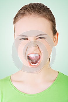 Youngwoman screaming with anger