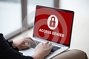 Your access is denied on laptop screen concept, protection security system photo