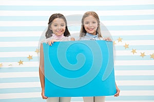 Your advertisement in good hands. Girls kids hold advertisement poster copy space. Children hold advertising banner