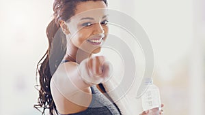 Your body needs you. Cropped portrait of an attractive young woman pointing towards the camera during her workout at