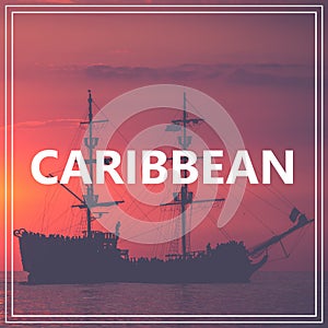 Your Course to Caribbean. Pirate Boat on the sea at sunset. Red