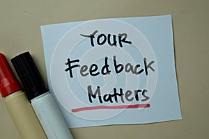Your Feedback Matters write on sticky notes isolated on office desk