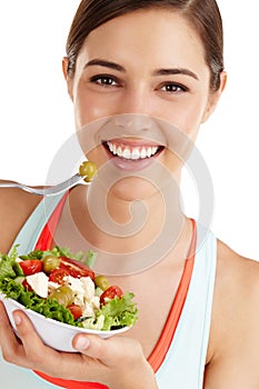 Your health is your real wealth. Woman against white background ready to eat salad.