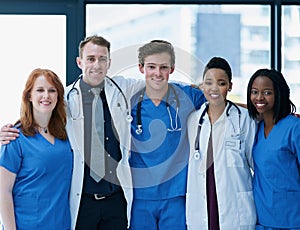 Your highly qualified healthcare team. Portrait of a team of confident young doctors working in a hospital.