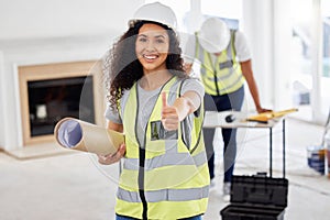 Your house will be ready soon. Shot of an attractive young contractor standing inside and showing a thumbs up.