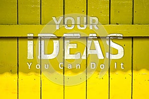 Your idea text on yellow Old Wood Background