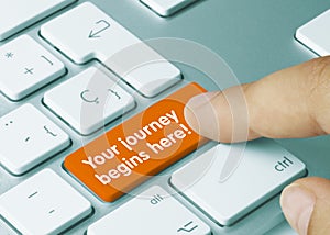 Your journey begins here! - Inscription on Orange Keyboard Key
