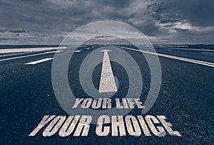 .Your Life Your Choice written on road. Toned. photo