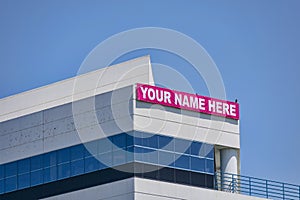 Your Name Here - large banner sign on vacant commercial building