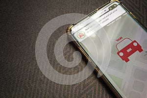 Your taxi dispatched notification smartphone screen app photo