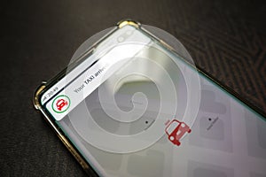 Your taxi dispatched notification smartphone screen app photo