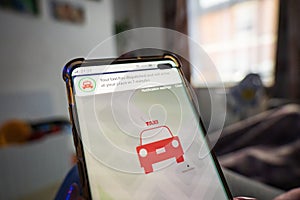 Your taxi dispatched notification smartphone screen app photo