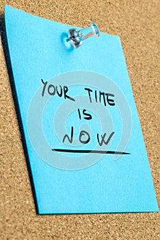 Your Time is Now Phrase on Pinned Sticky Note