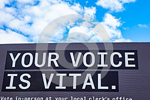 Your Voice Is Vital Sign With Blue Sky At Voting Office