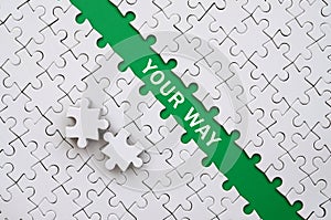 Your way. The green path is laid on the platform of a white fold