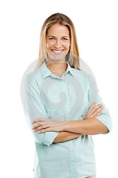 Youre never fully dressed without a smile. a happy woman posing against a white background.