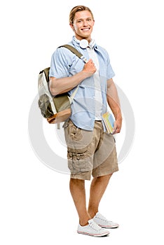 Youre never too old to learn something new. Full length shot of a handsome young student standing alone in the studio