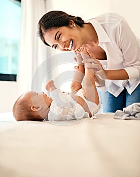 Youre the twinkle in mommys eye. a happy mother bonding with her baby boy at home.