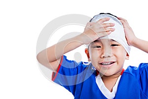 Youth athlete asian child with trauma of the head crying, isolat