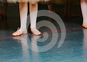 Youth Ballet Dancers Performing the Rehearsal in Red and White Tutu`s