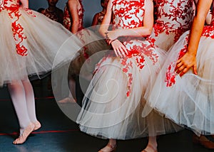 Youth Ballet Dancers Performing the Rehearsal in Red and White Tutu`s