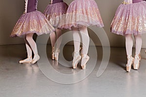 Youth Ballet Dancers Performing the Rehearsal in Red and White Tutu`s