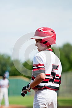 Youth baseball boy up to bat