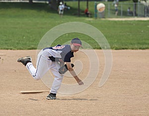 Youth baseball pitcher with clipping path