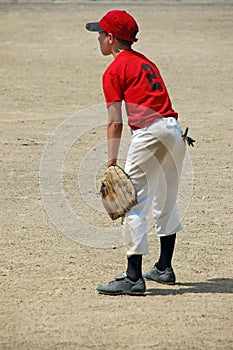 Youth baseball player in field