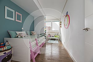 Youth bedroom with a white wooden bed