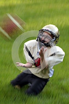 Youth Catching Football