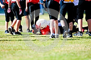 Youth football boy after tackle