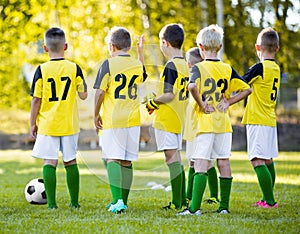 Youth football soccer training. Young boys training soccer on sports pitch