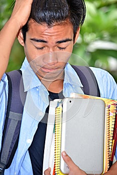 Youthful Asian Male Student Under Stress