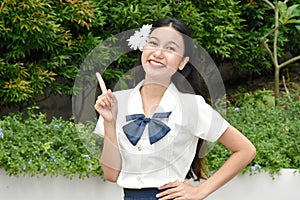 Youthful Diverse Female Smiling Wearing Skirt With White Flower