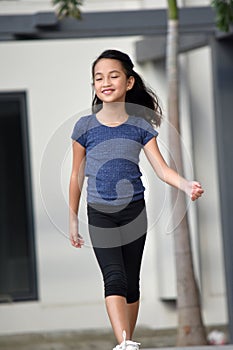 Youthful Diverse Girl Walking