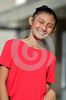 A Youthful Female Smiling