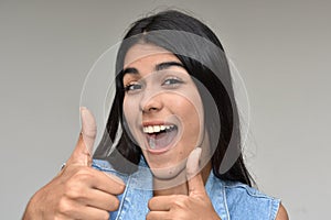 Youthful Girl With Thumbs Up
