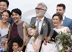 Youthful mature couple getting married at the beach