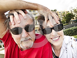 Youthful middle aged couple selfie