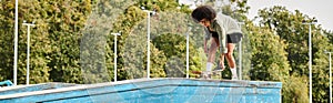 A youthful woman with a skateboard