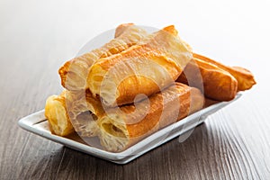 Youtiao.  Long golden brown deep fried dough strip