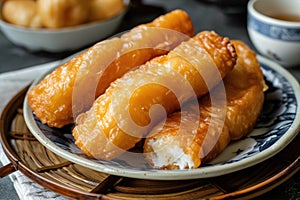 Youtiao on a plate in traditional style