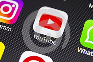 YouTube application icon on Apple iPhone 8 smartphone screen close-up. Youtube app icon. YouTube is an online video networking
