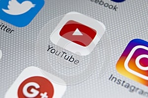 YouTube application icon on Apple iPhone 8 smartphone screen close-up. Youtube app icon. YouTube is an online video networking